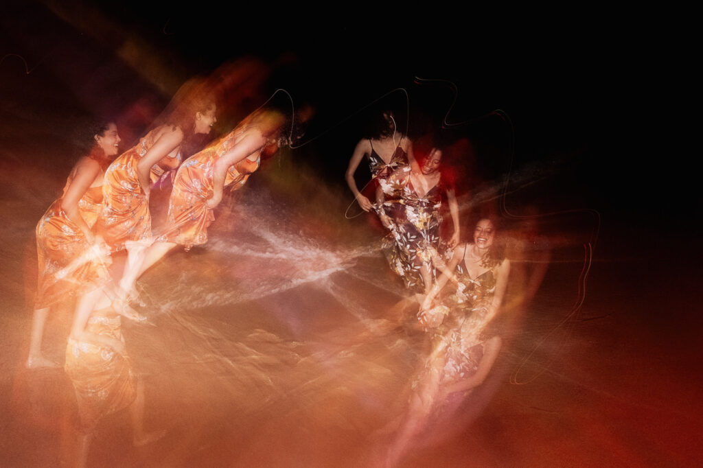 Bridesmaids dancing with motion blur at Las Caletas wedding reception, Puerto Vallarta, Mexico