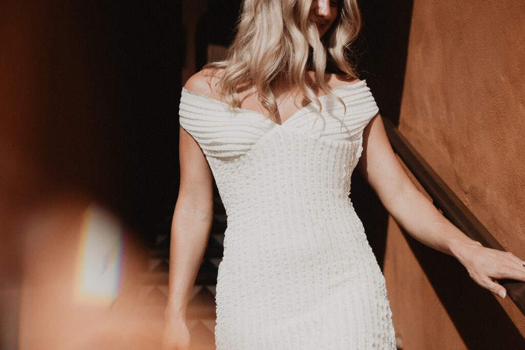 Bride in textured off-shoulder white gown at Casa Cosmos, Puerto Vallarta engagement session