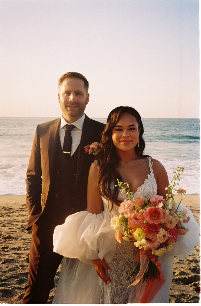 Bride and groom portrait on beach at Villa Valentin Sayulita, film wedding photography by Alex Obregón