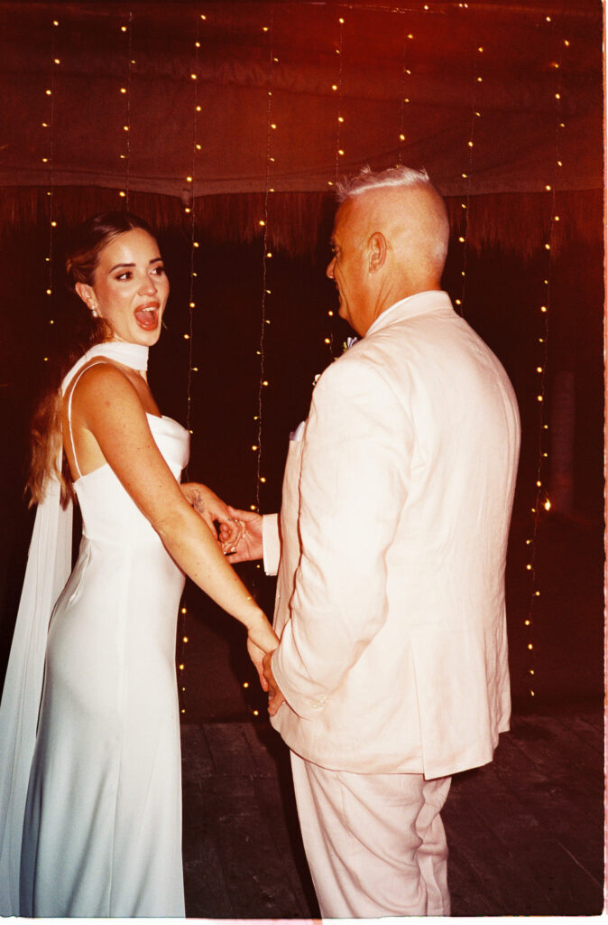 Bride and groom share first dance at Blue Venado Paamul wedding, captured on 35mm film