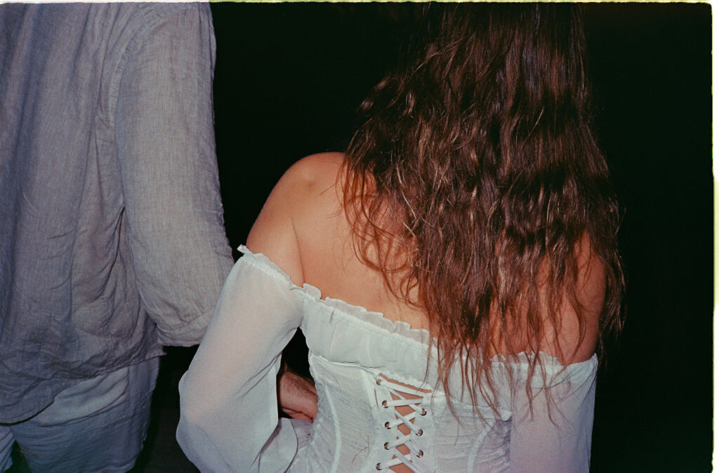 Couple embracing at night, Puerto Vallarta engagement session shot on 35mm film by Alex Obregón