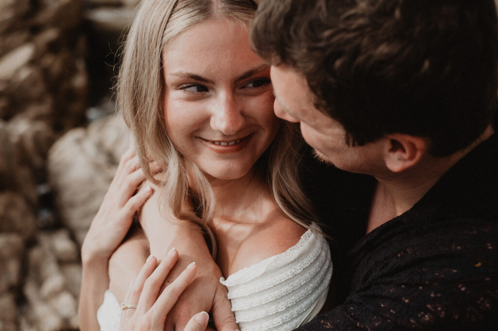 Couple sharing an intimate moment at Casa Cosmos Puerto Vallarta engagement session by Alex Obregón