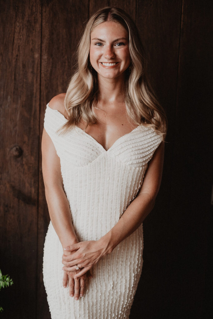 Bride in textured white gown smiling at Casa Cosmos, Puerto Vallarta engagement session by Alex Obregón