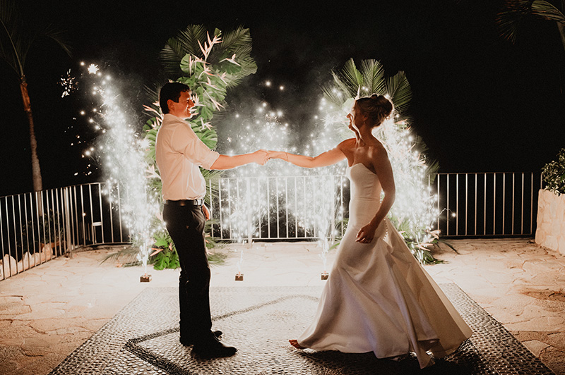 Bride and groom first dance with cold sparklers at Casa Cosmos Puerto Vallarta wedding reception