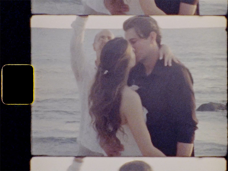 Couple sharing first kiss at beach wedding ceremony, St Regis Punta Mita, captured on 35mm film