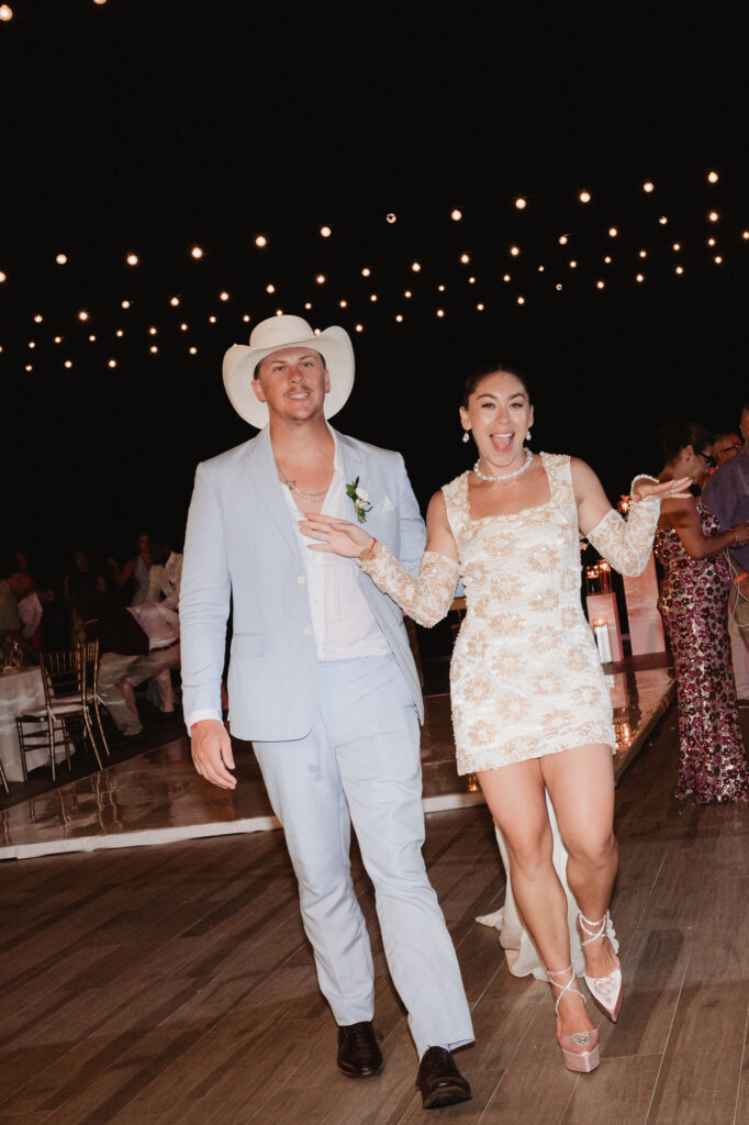 Bride and groom entrance at wedding reception, Hilton Puerto Vallarta, documentary photography by Alex Obregón