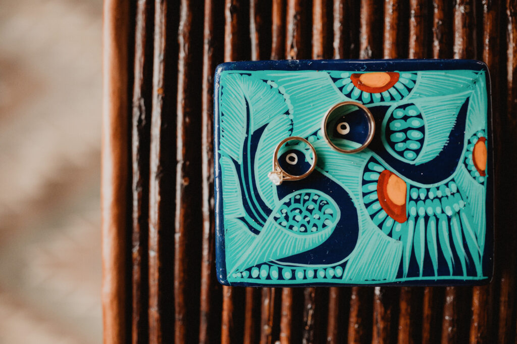 Wedding rings on painted talavera tile dish at Casa Cosmos Puerto Vallarta ceremony