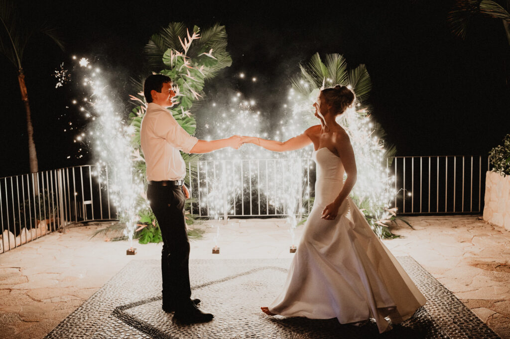 Bride and groom first dance with cold sparklers at Casa Cosmos Puerto Vallarta wedding reception