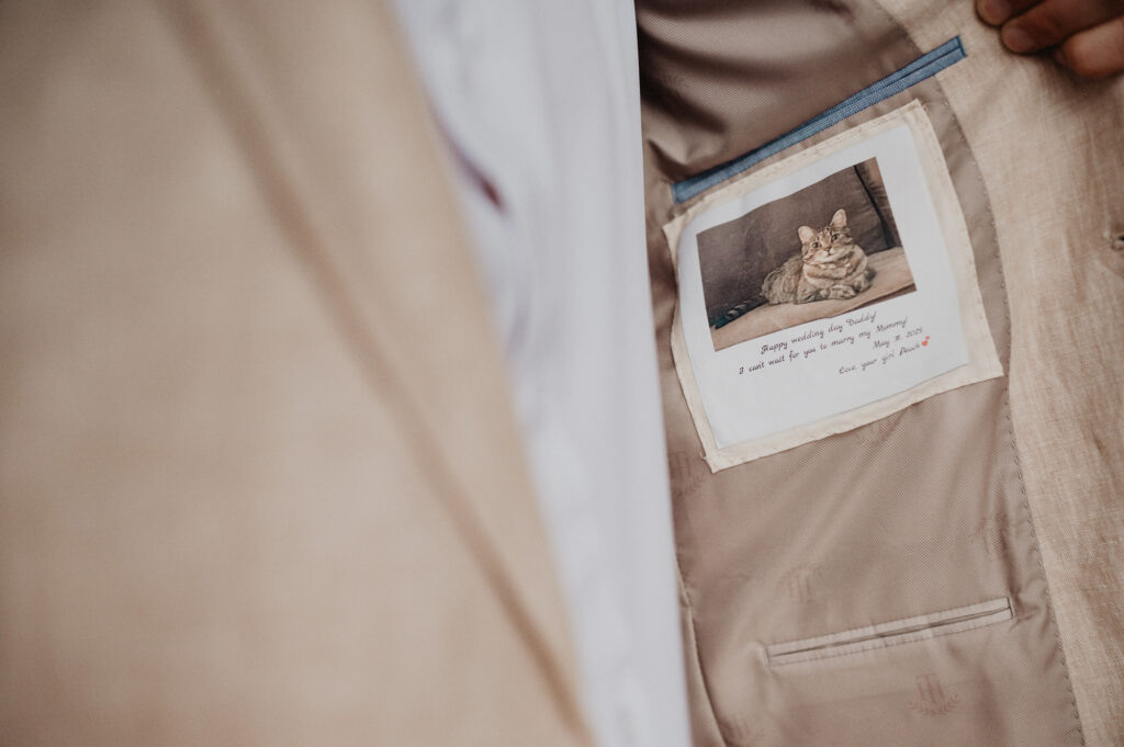 Groom's suit jacket lining with cat photo patch and handwritten wedding note, Casa Cosmos Puerto Vallarta