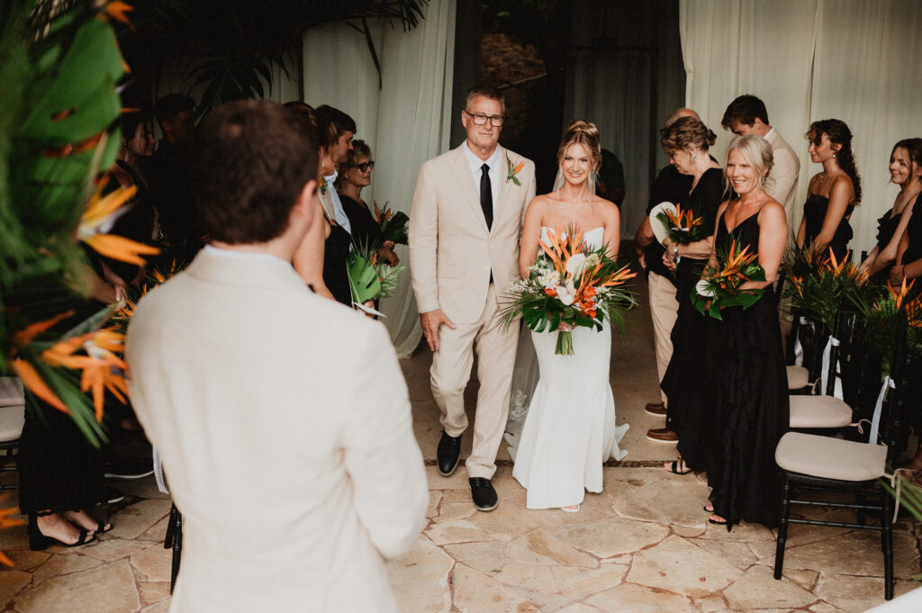 Bride walks down the aisle with her father at Casa Cosmos wedding ceremony, Puerto Vallarta