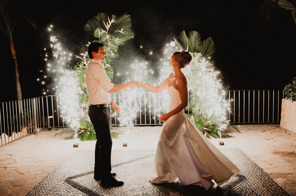 Bride and groom first dance with cold spark fountains at Casa Cosmos, Puerto Vallarta wedding reception