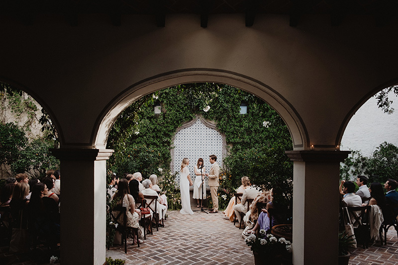 Wedding ceremony in courtyard archway, San Miguel de Allende, documentary film photography by Alex Obregón