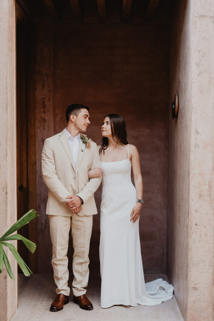 Bride and groom sharing a quiet moment at Rosa Morada, San Pancho elopement wedding