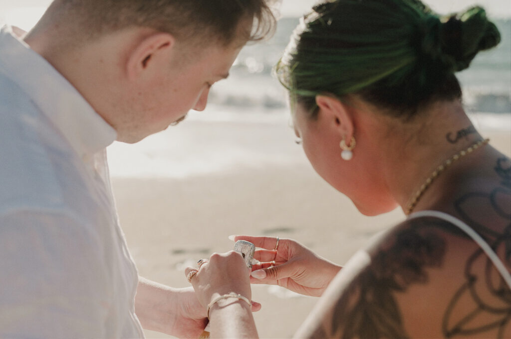 Couple exchanging rings during beach elopement at Villa Amor, Sayulita, Mexico