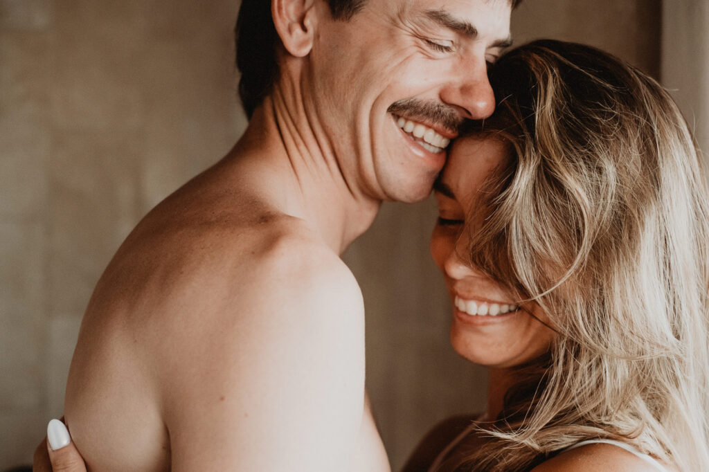 Couple laughing together during wedding reception at Villa del Sol, Sayulita, photographed by Alex Obregón