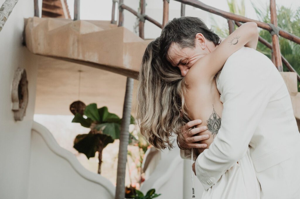 Couple sharing an emotional embrace during wedding ceremony at Villa del Sol, Sayulita Mexico