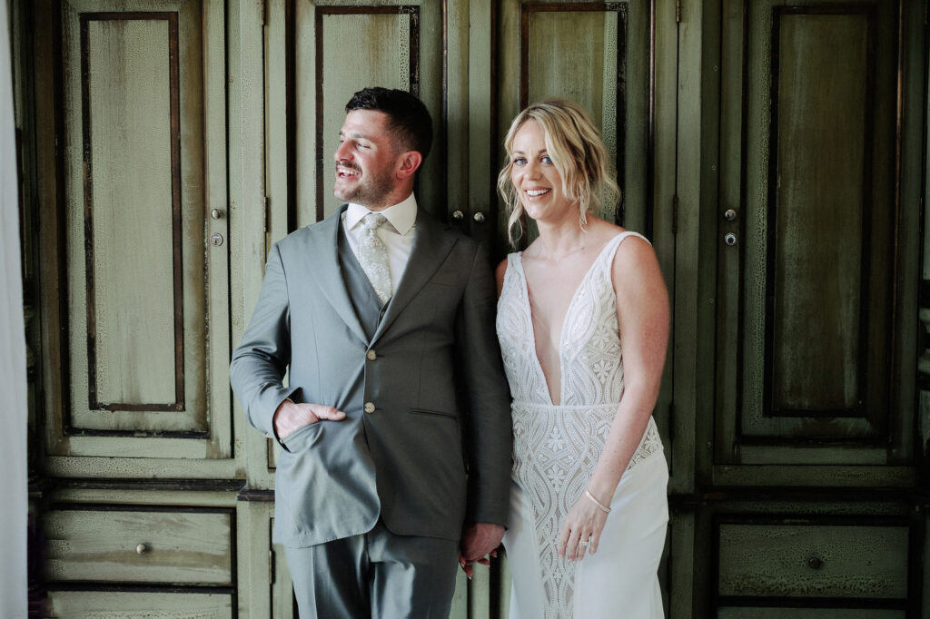 Bride and groom laughing together at Villa Amor Sayulita wedding, documentary photography by Alex Obregón